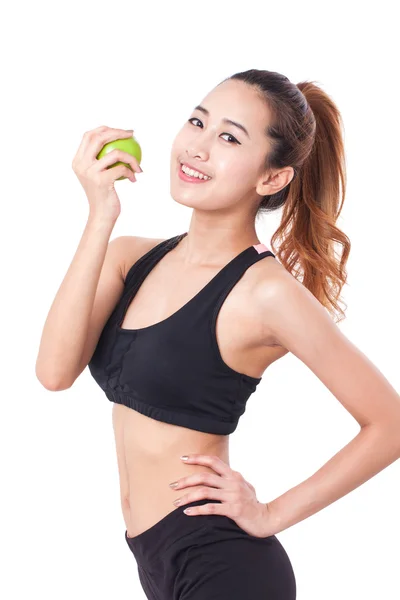 Fitness junge Frau hält Apfel — Stockfoto