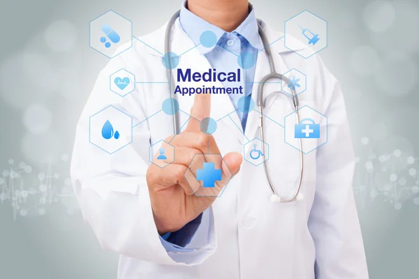 Doctor touching medical appointment sign — Stock Photo, Image