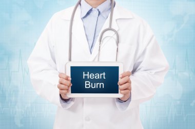 doctor with Heart Burn sign clipart
