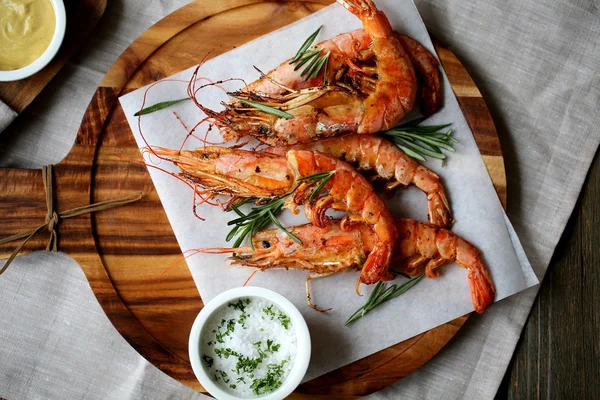 Tiger prawns with cherry tomatoes Stock Picture