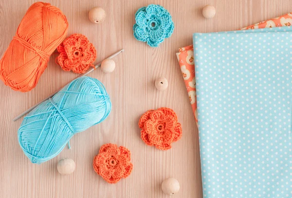 Handmade knitted crochet flowers and wood beads. — Stock Photo, Image