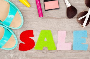 Women's accesories: summer sandals shoes, cosmetics, sunglasses.
