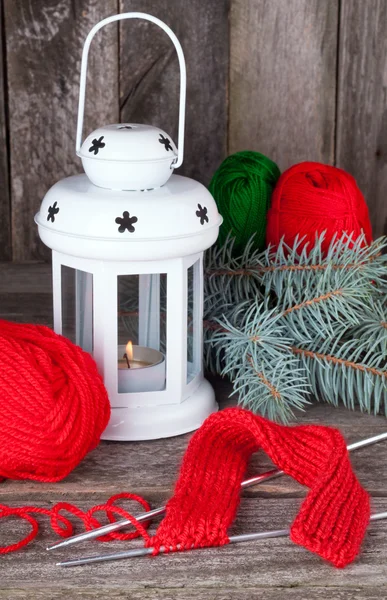 Knitting, yarn and knitting needles on the old wooden background — Stock Photo, Image