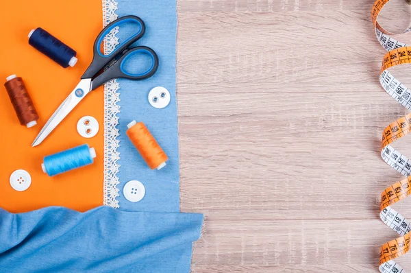 Jeans and cotton fabrics for sewing, lace, measuring tape and ac