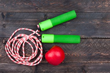 Spor ve sağlıklı yaşam konsepti arka plan. Atlama ipi ve app
