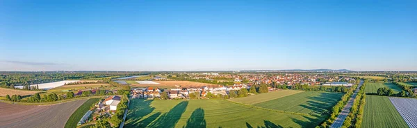 Drone image of village Graefenhausen near Darmstadt in evening light during daytime