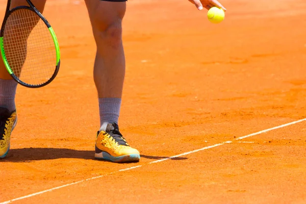 Ein Tennisspieler Mit Einem Schläger Der Hand — Stockfoto