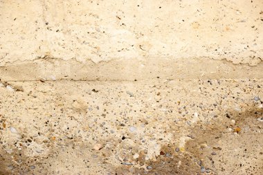 Çatlakları ve çizikleri olan beton bir duvarın dokusu 