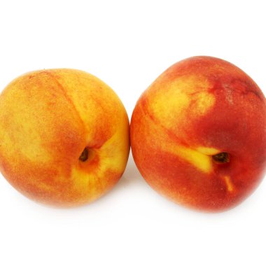 İki olgun şeftali meyvesi