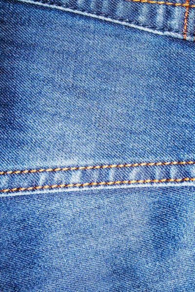 旧牛仔裤的蓝色斜纹棉布质地 — 图库照片