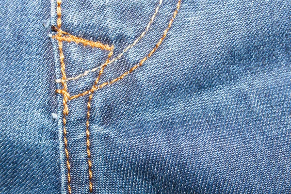 旧牛仔裤的蓝色斜纹棉布质地 — 图库照片