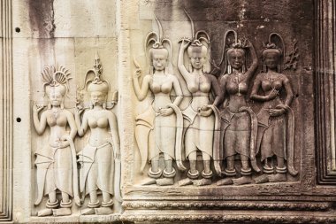 Siyam Reap, Siyam Reap / Kamboçya - 24 Ekim 2016: Görüntü Angkor Wat kompleks tapınağında. Kadın dansçıların detayları. Tapınakta geleneksel dans heykeli.