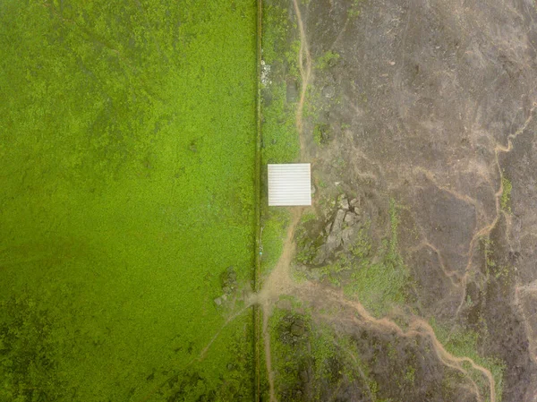 Aerial image of a border wall in Lima Peru between districts. Watchtower control.