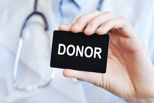 Doctor Holding Black Paper Card Text Donor Medical Concept Donor — Stock Photo, Image