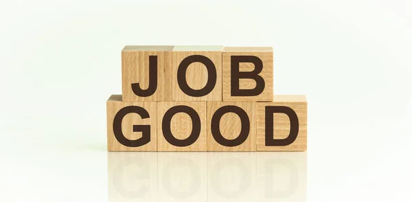 Job Good 文字を持つ木製のブロックからの単語 白い背景にフロントビュー — ストック写真