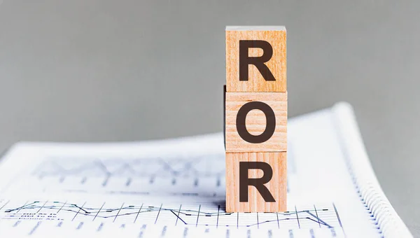 Ror Rate Return Acronym Wooden Cubes Columns Numbers Background Background — Stock Photo, Image