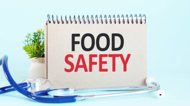 Gıda güvenliği, beyaz bir kağıt parçasına yazılan teşhis. Tedavi ve hastalıkların önlenmesi. Tıbbi konsept. Seçici odak