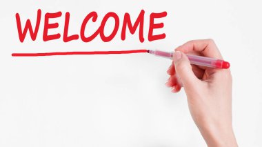 El yazması yazması Kırmızı renk kalemi, konsept, stok resmi ile hoş geldiniz