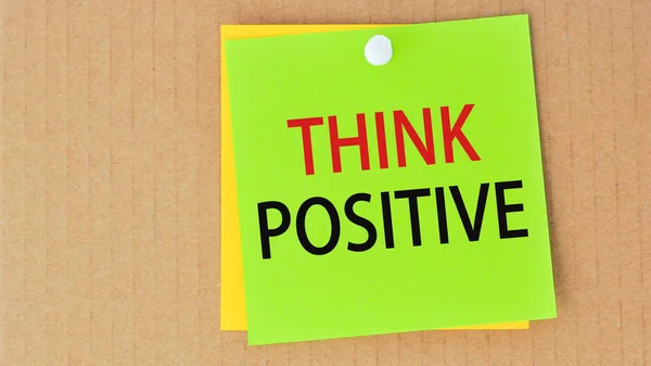 Think Positive Written Green Paper Pinned Corkboard Business Concept — Foto Stock