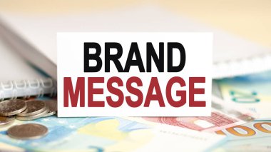 finance and economics concept. on the table are bills, coins and a white paper sign on which it is written - buy or rent