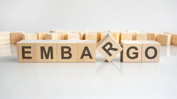 Embargo Word Wooden Blocks Letters Gray Background Reflection Caption Mirrored — Stock Photo, Image