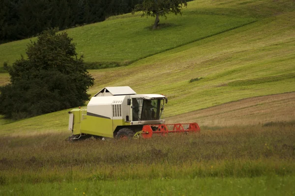 Tractor at work on field — Stock Photo, Image