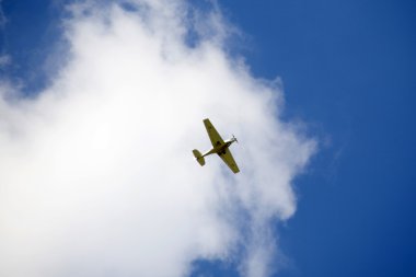 sailplane in the air with blue sky fly in cloud