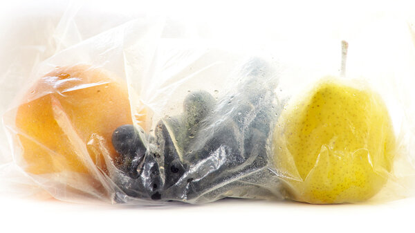 Washed Fruit in Plastic Bags Stock Photo