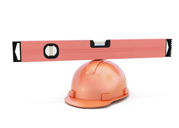 Conceptual image of a construction level on a helmet — Stock Photo, Image