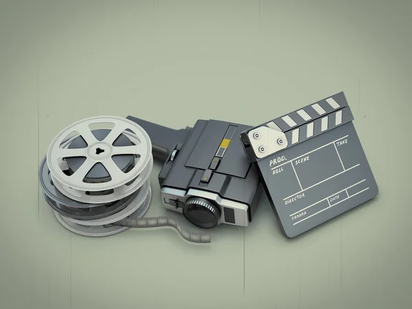 Ancient movie camera near a clapperboard and a film — Stock Photo, Image