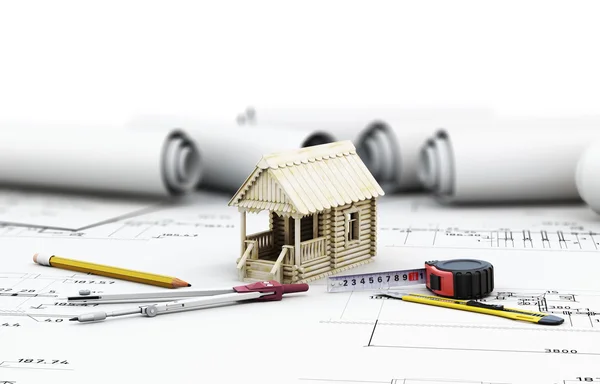 Tools of the architect and the wooden house in the drawings — Stock Photo, Image