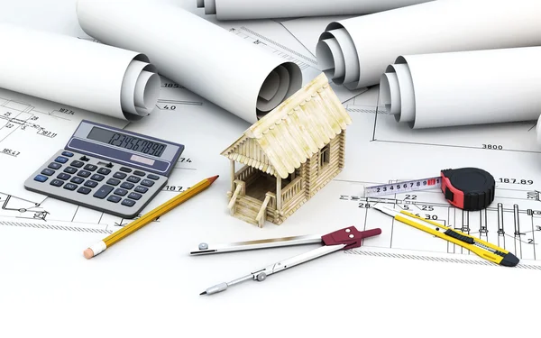 Engineering project architect with tools and wooden house — Stock Photo, Image