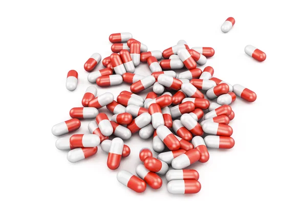 Червоно-білі таблетки ізольовані на білому тлі. 3D візуалізація — стокове фото