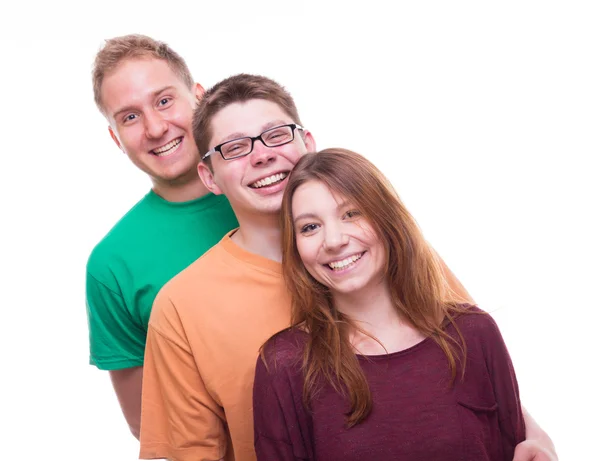 Drie vrienden permanent en lachen - studio shot — Stockfoto