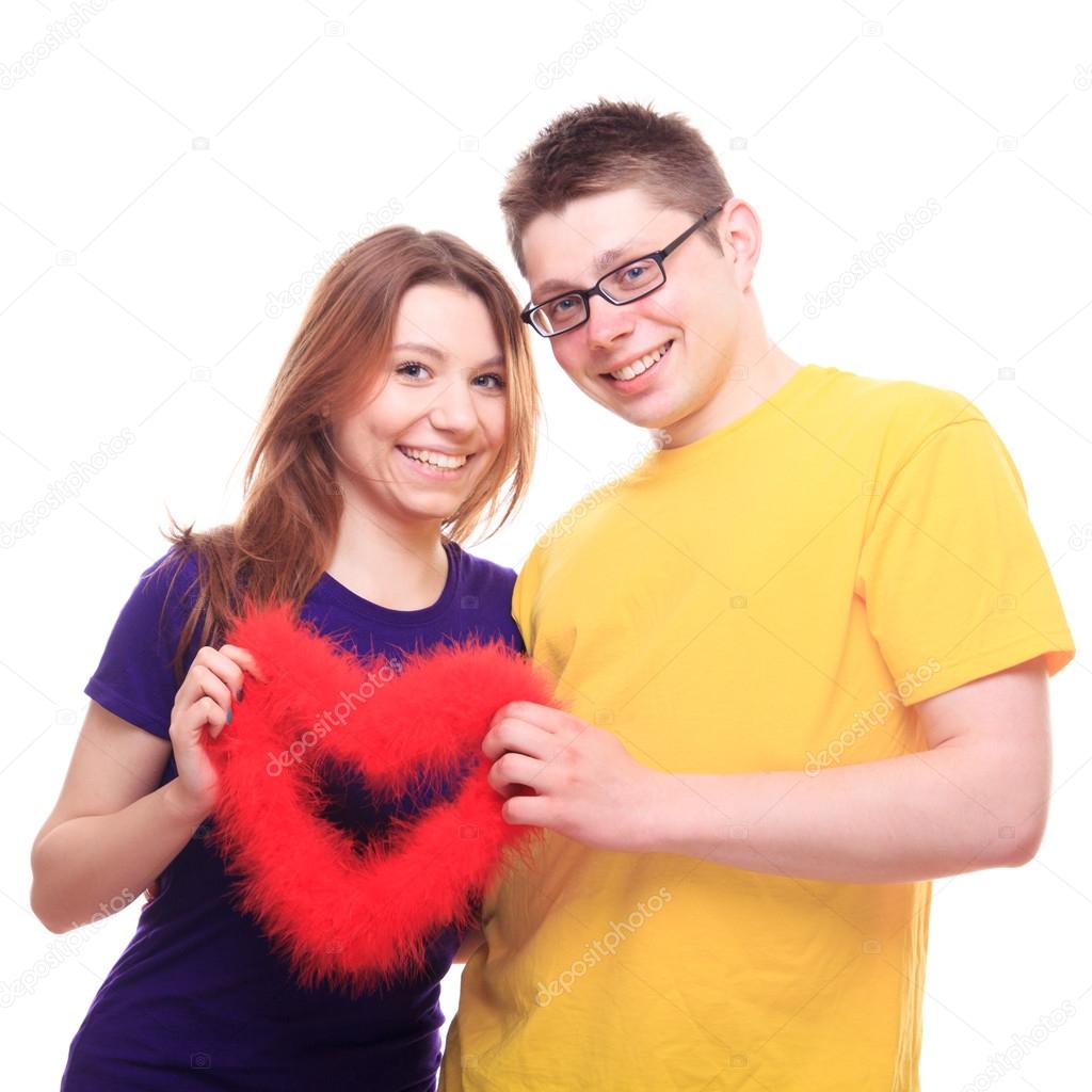 Boy and Girl in love holding heart