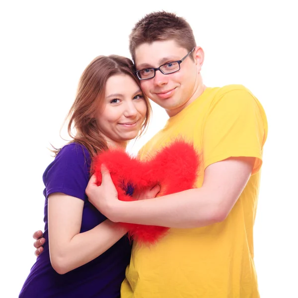 Chlapec a dívka v rádi drží srdce a přitulit — Stock fotografie