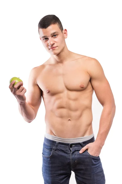 Fitness gespierde man eet appel — Stockfoto