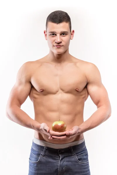 Fitness gespierde man met apple — Stockfoto