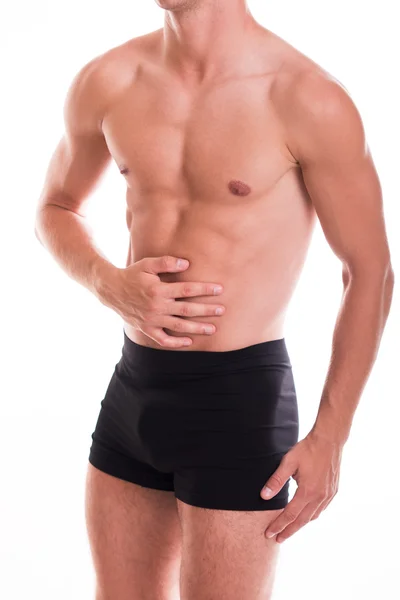 Athletic man with abdominal pain — Stock Photo, Image