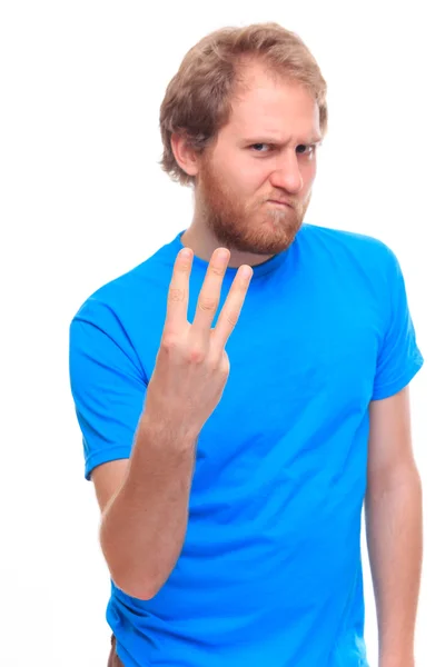 Homem com raiva barbudo mostrando três dedos — Fotografia de Stock