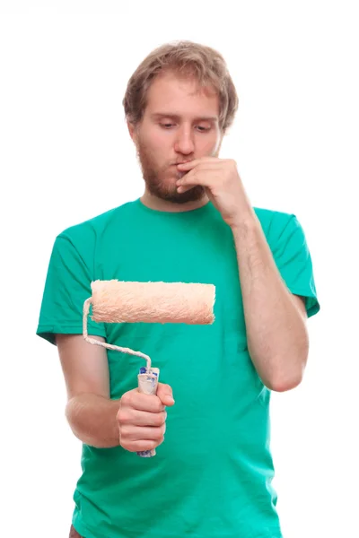 Man painting with a roller — Stock Photo, Image
