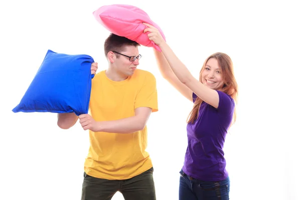 Boy and girl have battle of pillows — Stock Photo, Image