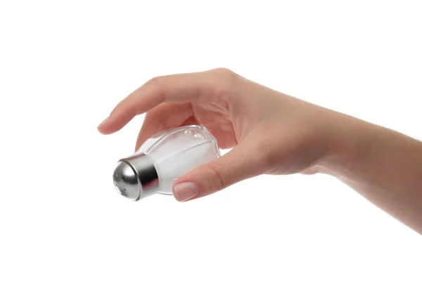 Hand holding a salt shaker — Stock Photo, Image