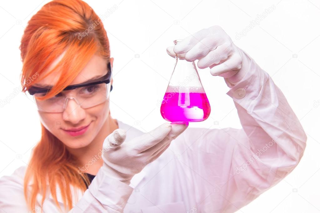 Chemist woman holding a test tube in a lab