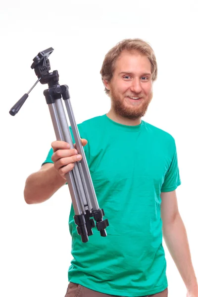 Homem feliz barbudo segurando um tripé — Fotografia de Stock