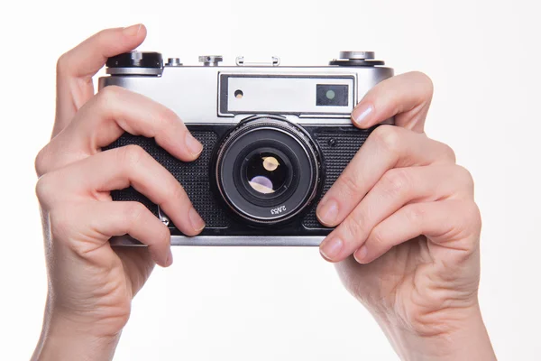 Pressing shutter in 35mm classic photo camera — Stock Photo, Image