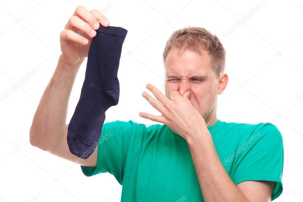 Man holding smelly sock