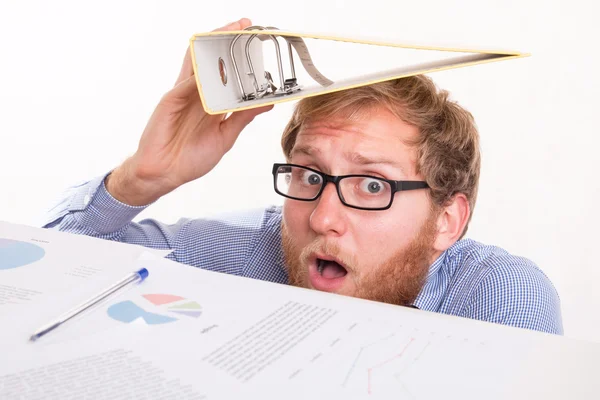 Frightened man under  the desk in the office — Stock Photo, Image