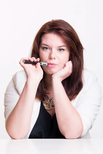 Woman smoking e-cigarette — Stock Photo, Image