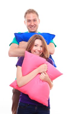 erkek ve kız renkli yastıklar holding